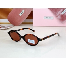 Miu miu Sunglasses